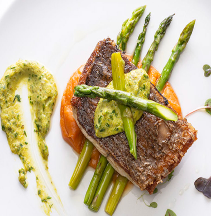 Plated cooked salmon with sides